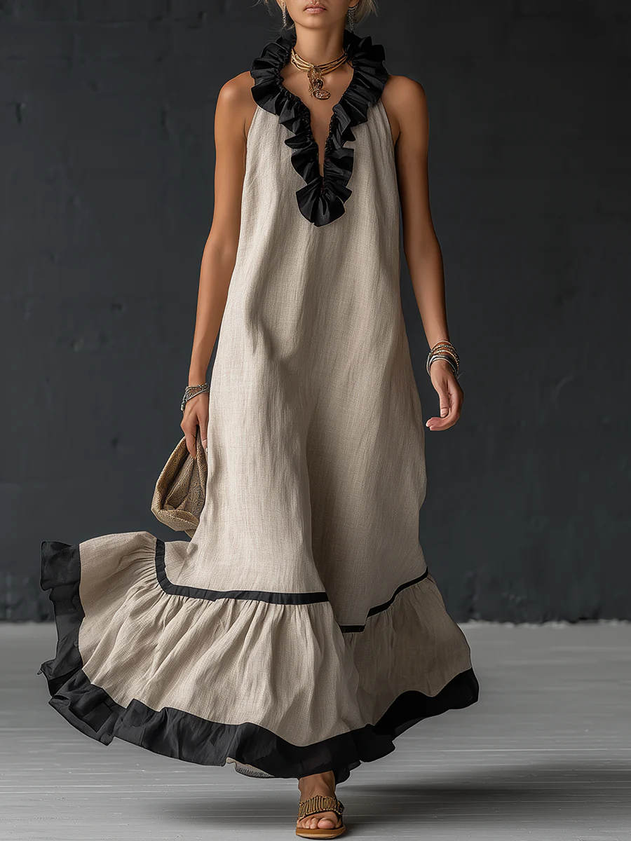 Abito lungo elegante con volant