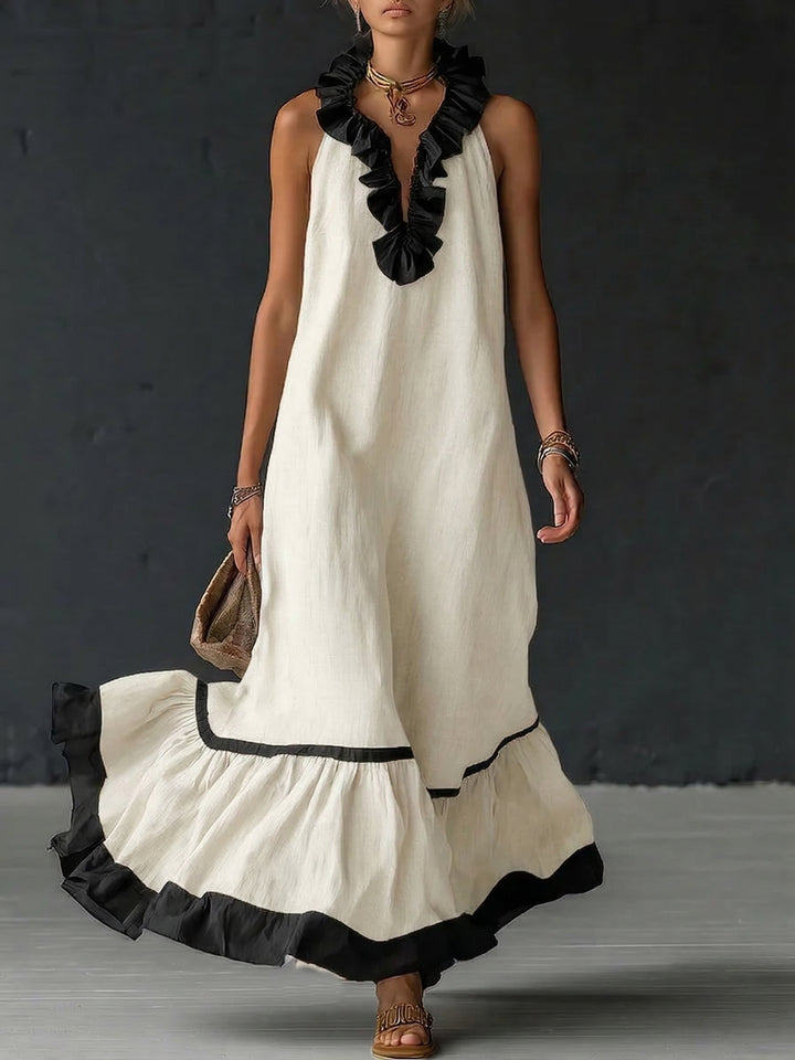 Abito lungo elegante con volant