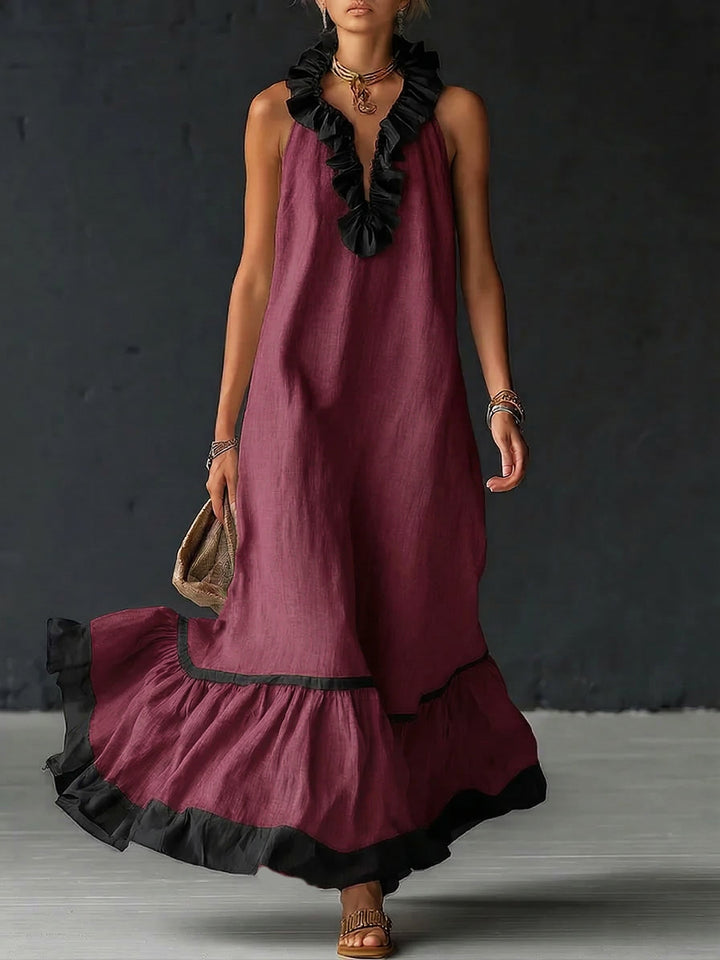 Abito lungo elegante con volant